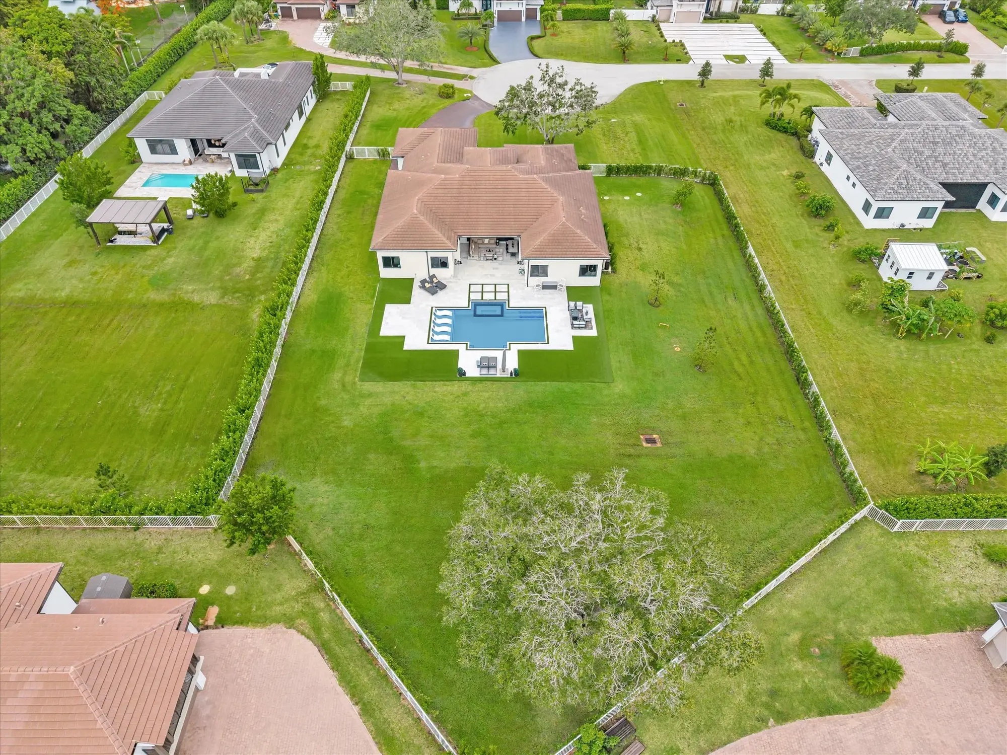 Full exterior view of luxury new construction home Southwest Ranches FL