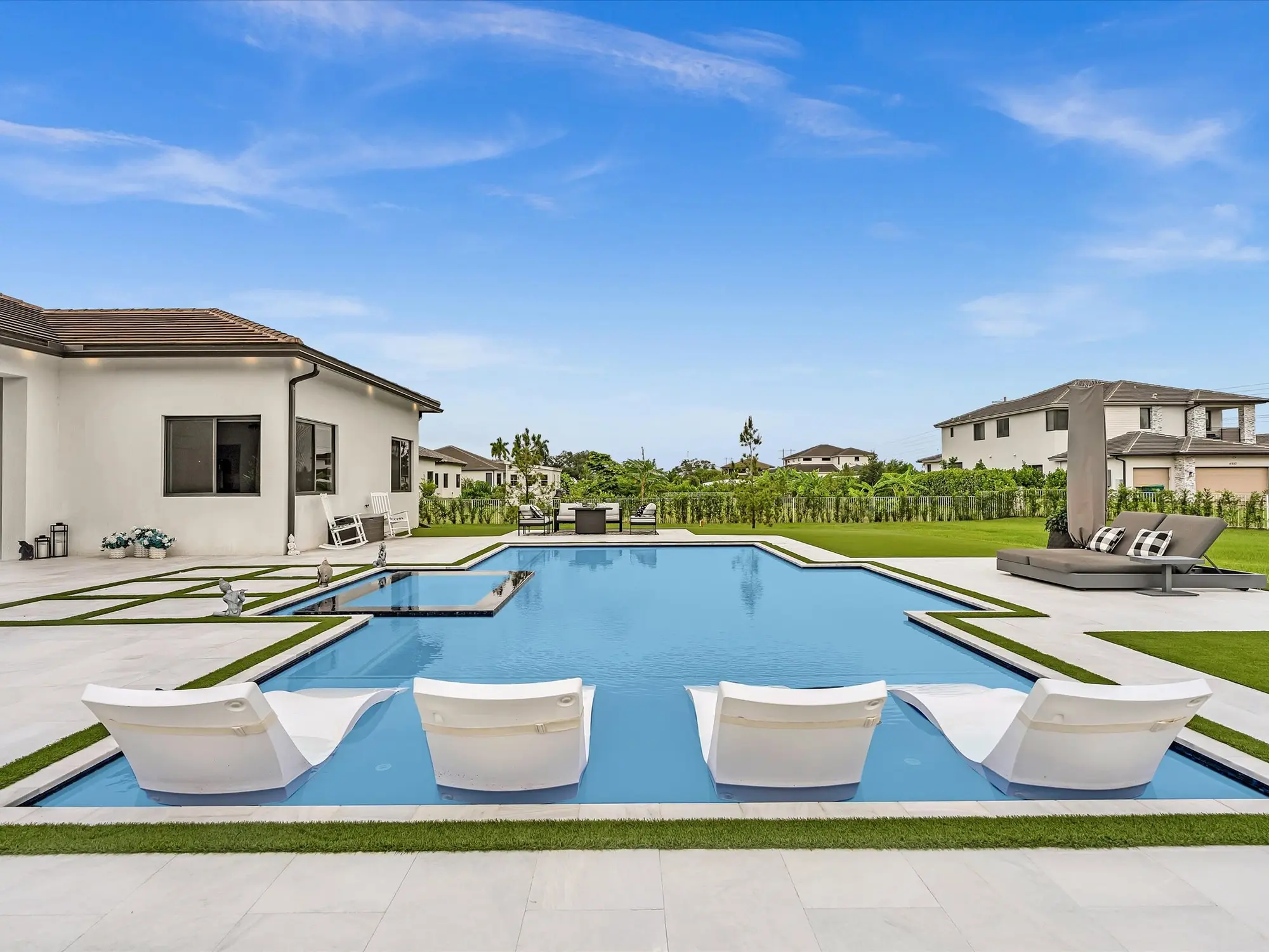 Resort-style swimming pool at 4980 SW 159th Ave Southwest Ranches luxury estate